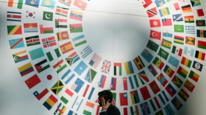 Analysing the geopolitics of generative AI Flags at the World Bank illustrating an article with viewpoints from Boston Consulting Group, or BCG, on how generative AI is reshaping global competition and geopolitics, presenting challenges and opportunities for nations and businesses alike.