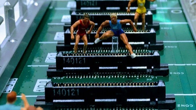 Public trust deficit is a major hurdle for AI growth Figures hurdling on a computer board as while politicians tout AI’s promise of growth and efficiency, a new report reveals a public trust deficit in the technology.