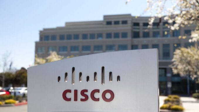 "San Jose, United States - February 11, 2013: A large Cisco Systems sign sits outside their headquarters located at 400 Tasman Dr. in San Jose California. Cisco Systems is a multinational company that produces computer networking equipment."