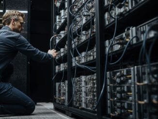 Engineer adjusting Bitcoin mining servers in a data center amid network power struggle over anti-spam proposal and disputed node support